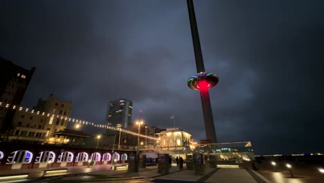Brighton-coastal-city-at-night-with-i360-tourist-attraction-in-England
