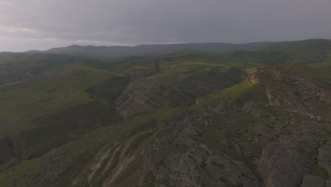 Aerial-shot-of-uneven-terrain-in-the-Georgian-mountain-range