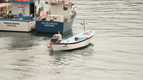Fishermen-On-A-Fishing-Boat-Sailing-In-Fishing-Village-Sao-Mateus-da-Calheta-In-Terceira-Island,-Azores,-Portugal
