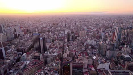 Aerial-view-establishing-an-epic-sunset-of-the-city-of-Buenos-Aires,-Argentina