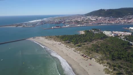 view-of-the-city-Viana-do-Castelo-Portugal-look-from-above-drone-shot-aerial-birds-eye-Lima-Limia-river-Atlantic-ocean-sunny-day-bridge-sideways-pan