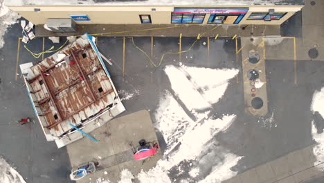 Deadly-Winter-Storm-Blew-Gas-Station-Roof-Down-in-Buffalo-Downtown---Aerial-top-down