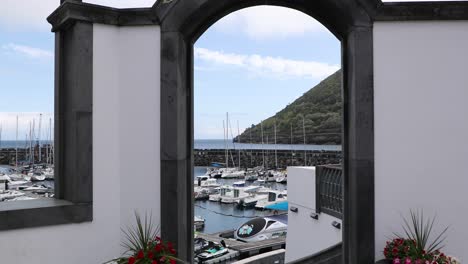 Harbor-Viewed-Through-The-Archway-In-Angra-Do-Heroismo-In-Terceira-Island,-Portugal
