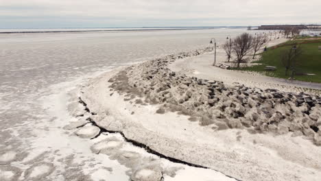 Drone-Flying-Over-Icy-Landscape,-Deadly-Winter-Storm,-Buffalo,-New-York,-USA