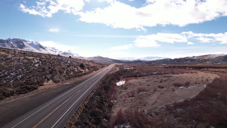 Sierra-Nevada-famous-asphalted-road-with-scenic-mountains-landscape-aerial-footage