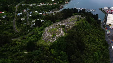 Cemetery-near-port-Chalmers-in-Dunedin-city,-aerial-drone-view
