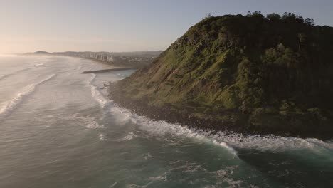 Aerial-views-over-the-North-side-of-Burleigh-Heads-on-the-Gold-Coast,-Australia-at-sunrise