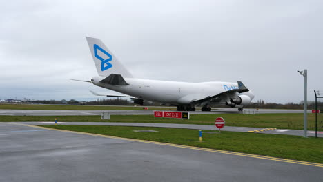 A-Heavy-Cargo-Airplane-Enters-the-Runway-on-a-Cloudy-Day