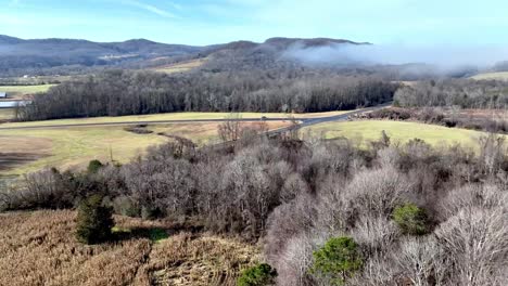 aerial-of-farm-fields-in-winter-in-the-brushy-mountains-near-wilkesboro-and-north-wilkesboro-nc,-north-carollina