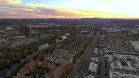 Drone-panning-shot-at-sunrise-in-Mission-Valley,-San-Diego