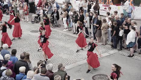 Group-of-women-dance-in-Molde-Jazz-festival-wearing-red-skirts