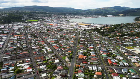 Rooftop-of-Dunedin-city-in-New-Zealand,-aerial-drone-view