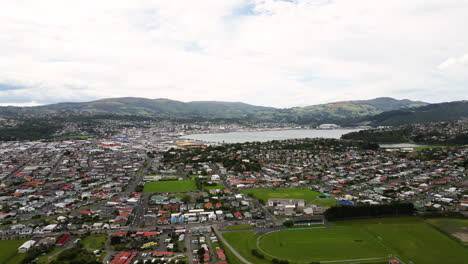 Panoramic-View-Over-City-Dunedin-In-New-Zealand---aerial-drone-shot