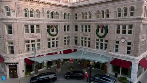 Aerial-rising-view-of-Marriott-hotel-decorated-for-Christmas