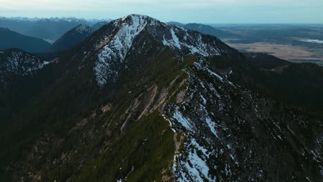 Cinematic-drone-aerial-at-Herzogstand-mountain-top-peak