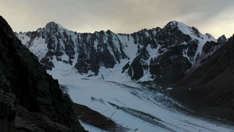 Revealing-drone-shot-of-a-passage-through-the-Ak-Sai-Glacier-in-Kyrgyzstan