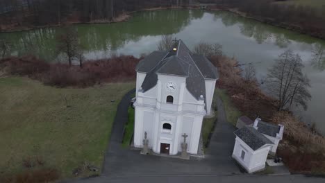 Drone-shot-of-a-sloping-church-near-Karviná,-in-a-coal-mining-area