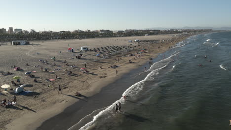 Drone-Video-of-a-Summer-Day-on-a-Beach-in-Valencia,-Spain