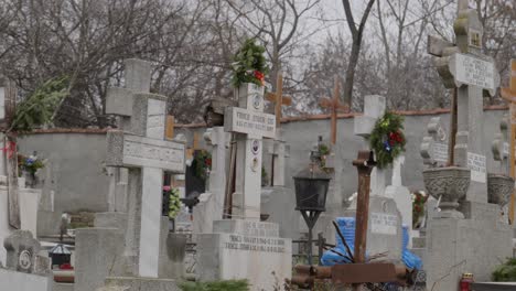 Christian-Cemetery.-Christmas-Period.-Graves-With-Fir-Wreath