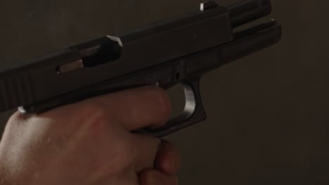 Hand-firing-a-Glock-17-handgun-in-slow-motion