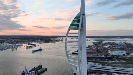 Drone-orbit-of-the-Spinnaker-Tower-in-Portsmouth-with-Sunset-Flares-and-Light-Rays-in-4K