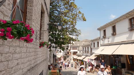 Vibrant,-bustling-scene-of-Gjirokaster,-Albania,-on-a-sunny-day