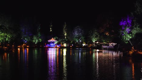 Festival-Of-Lights-Across-The-Lake-At-Night-At-The-Pukekura-Park,-New-Plymouth,-Taranaki-In-New-Zealand