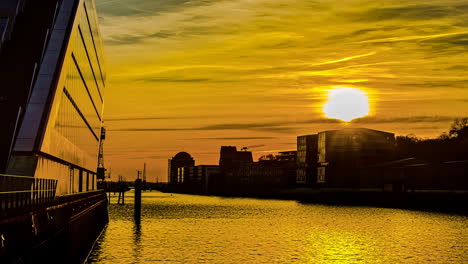 Time-lapse-shot-of-golden-sunset-at-port-in-Hamburg-in-the-evening