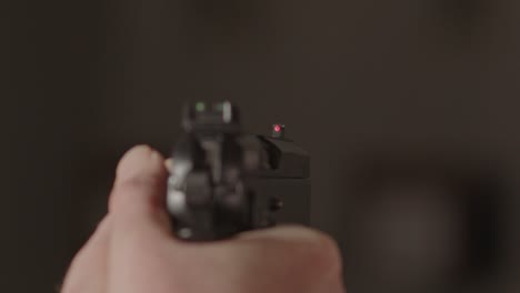 9mm-handgun-being-aimed-at-something