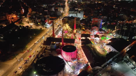 Drone-flight-around-the-Christmas-market-in-the-former-gas-factory-in-Athens,-Greece