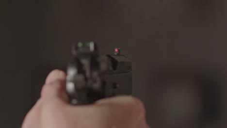 Close-up-of-9mm-pistol-firing-multiple-shots