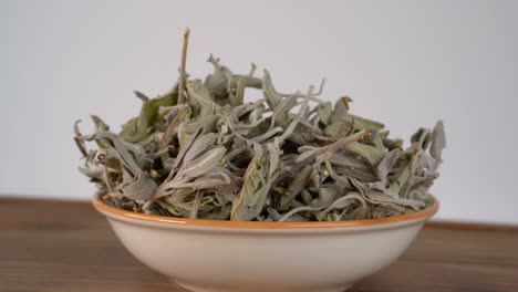 Sage-Herb-dried-collectively-in-a-bowl-cinematic-shot