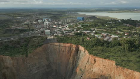 Rotating-aerial-shows-massive-rock-pit-at-Cullinan-Diamond-Mine