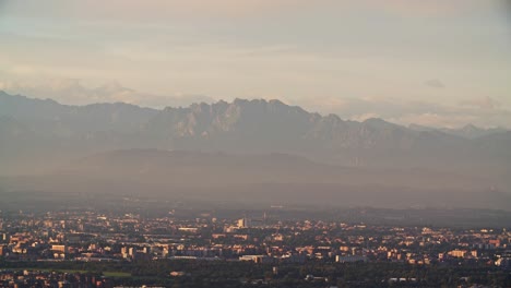 Resegone-mountain-and-Milan-cityscape,-view-from-above