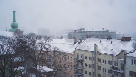 Static-Shot-Overlooking-Snow-Covered-Rooftops-In-St