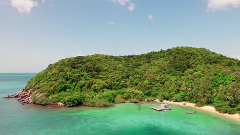4K-Aerial-Drone-Footage-of-Mae-Haad-and-Koh-Ma-on-Koh-Phangan-Island-in-Thailand-Pan-to-the-Right-to-Reveal