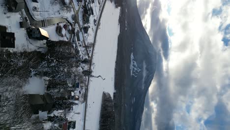 Truck-aerial-view-of-Mount-Kurohime,-Nagano,-portrait-video
