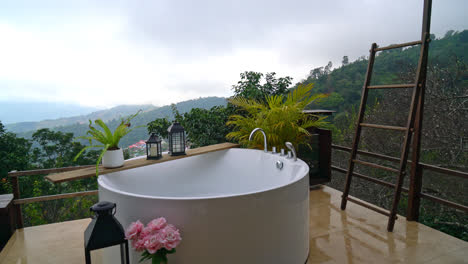 outdoor-bath-tub-with-beautiful-mountain-hill-view-background