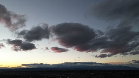 Drone-Timelapse-at-sunset-of-Santa-Fe,-NM
