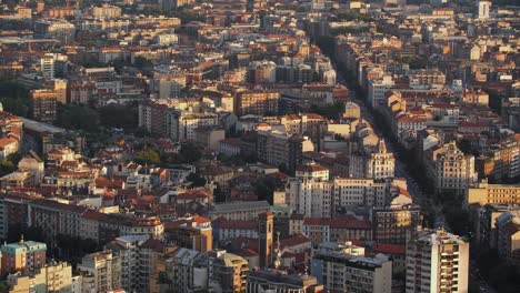 Sunny-Milan-cityscape-and-rooftops,-view-from-above