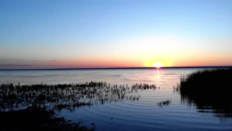 Sunrise-Scene-On-A-Lake---drone-shot