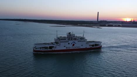 Red-funnel-ferry-with-calshot-at-sunset