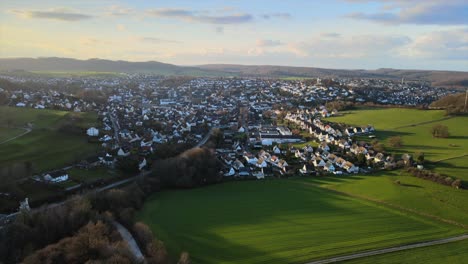 Winter-Sunset-in-Warstein:-Drone-Footage-of-the-Town-Nestled-in-the-Majestic-Sauerland-Mountains