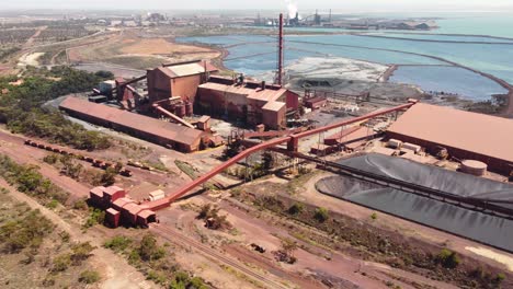 Aerial-drone-shot-of-Whyalla-Steelworks-Port-Augusta-mining-town-iron-ore-Middleback-range-Adelaide-outback-industry-travel-tourism-South-Australia-4K