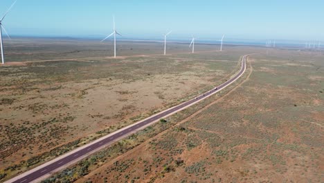 Aerial-drone-pan-shot-of-Port-Augusta-Renewable-Wind-Solar-Farm-Climate-Change-environment-wind-turbine-Winninowie-Adelaide-outback-South-Australia-4K