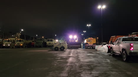 Military-And-Snow-Vehicles-At-Refueling-Command-Post-At-Night-In-Buffalo,-New-York,-USA