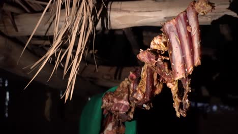 dry-meat-hanging-from-a-tent-in-the-nomad-base-in-the-desert-in-Morocco