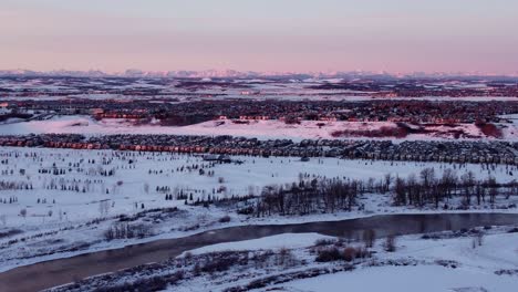 Drone-footage-of-Calgary's-golden-hour-during-a-beautiful-winter-sunrise