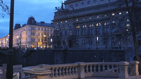 Prague-national-theatre-view-from-Slovanske-embankment-during-blue-hour-early-morning-winter-time