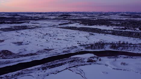 A-drone's-aerial-view-of-Calgary-during-a-picturesque-winter-sunrise